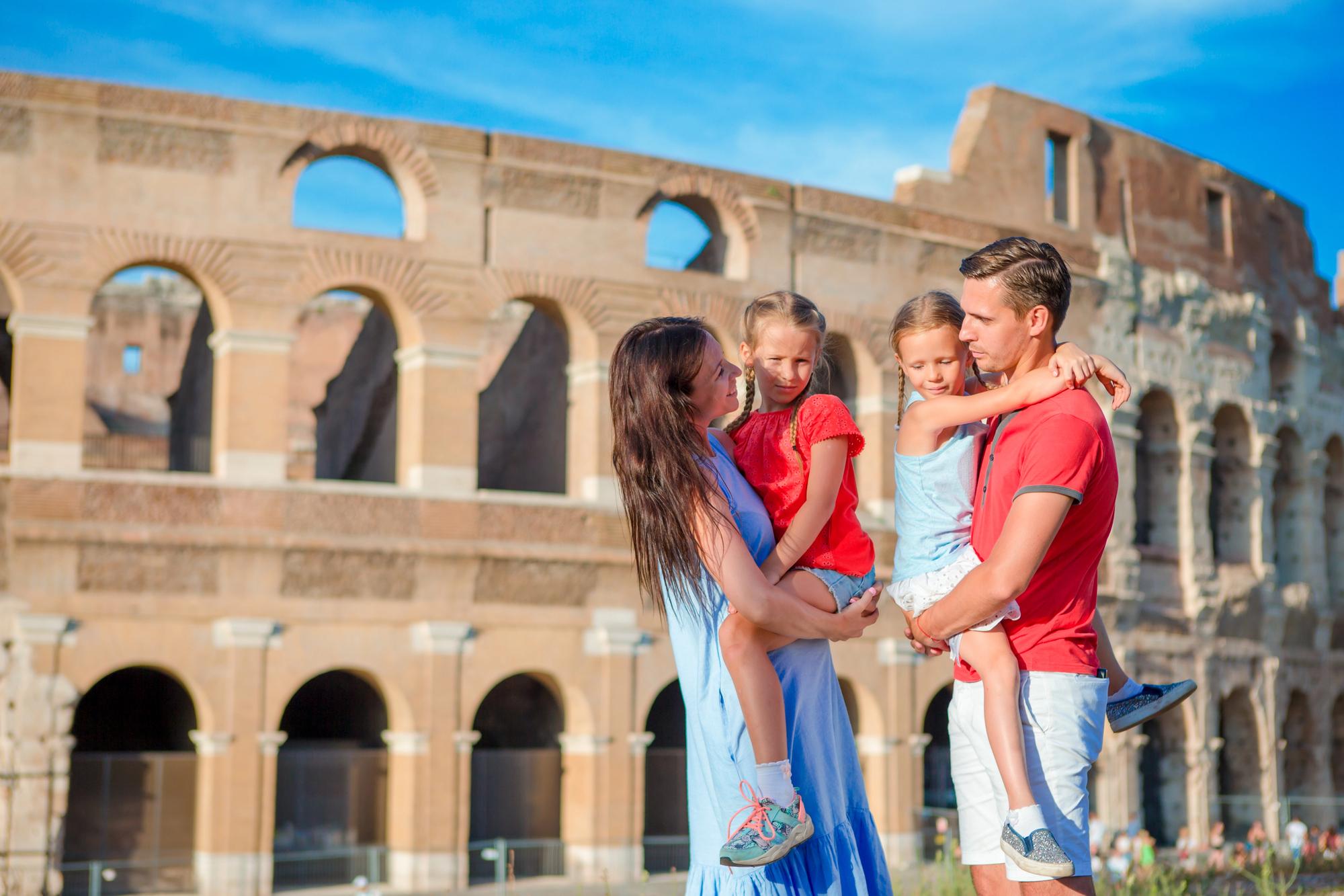 Best Destinations for Multigenerational Travel in 2025: Top Family Friendly Getaways - Family in Front of the Colosseum in Rome, Italy